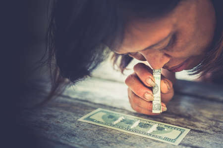 Drugs concept. Closeup picture of drug addict using drugs.の写真素材