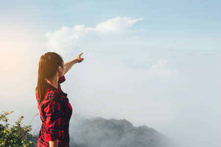 Happy people smiling at the Mountain on Bright day.の写真素材