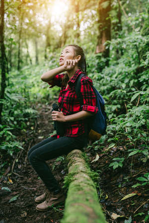 Women tired during hiking.adventure, travel, tourism,の写真素材
