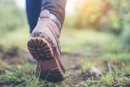 Shoes Man walking on a forest path in autumn and Lifestyle hiking concept.の写真素材