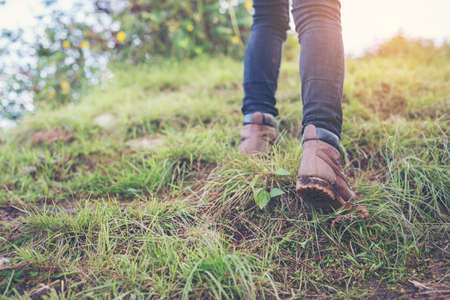 Shoes Man walking on a forest path in autumn and Lifestyle hiking concept.の写真素材