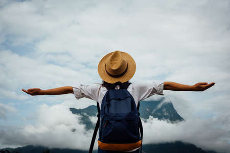 happy female tourist  to travel on atlas in hiking during vacation.の写真素材