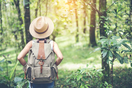 Happy woman tourist to travel in wild trip  hiking during vacation.Travel concept.の写真素材