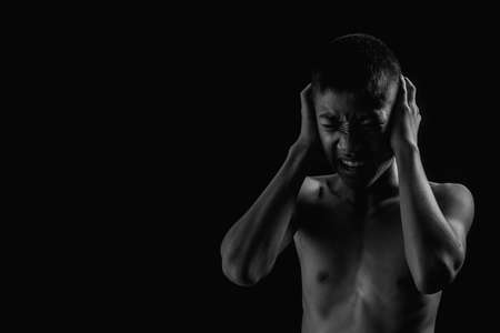 The boy was handcuffed on a black background, Violence children and trafficking concept.
