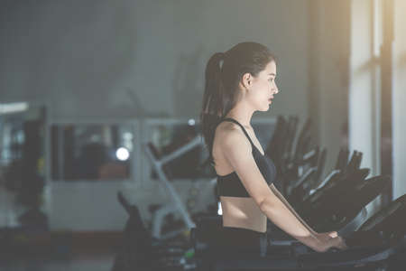 Fitness woman health exercise at gym. Healthy workout concepts.の写真素材