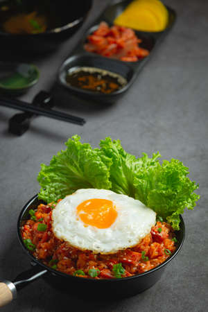 korean food ;fried rice with kimchi serve with fried eggの写真素材