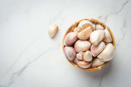 fresh raw garlic ready to cookの写真素材