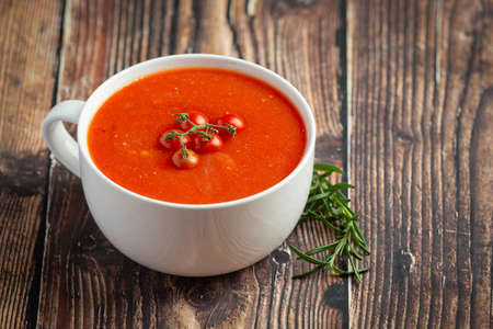 warm tomato soup serve in bowl