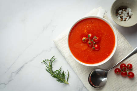 warm tomato soup serve in bowlの写真素材