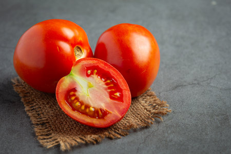 fresh tomatoes ready to cookの写真素材
