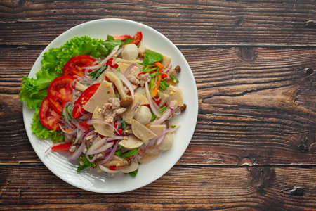 Thai food ;mixed spicy pork sausage salad with vermicelli noodleの写真素材