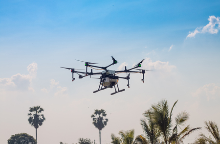 Agriculture drone aircraft for farming fly on skyの写真素材