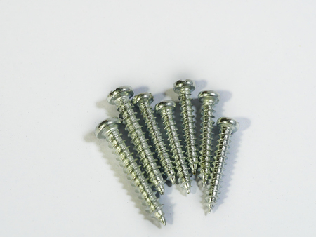Screws for construction on a white background, metal screw, iron screw, chrome screw, screws as a...