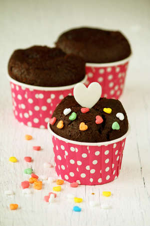 chocolate cupcake with heart candyの写真素材