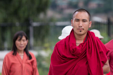 Bhutan s monk  THIMPHU, BHUTAN - JULY 12, 2013 in Thipmhuのeditorial素材