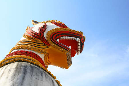 Mon Lion Statue in Sangkhlaburi on clear blue skyのeditorial素材