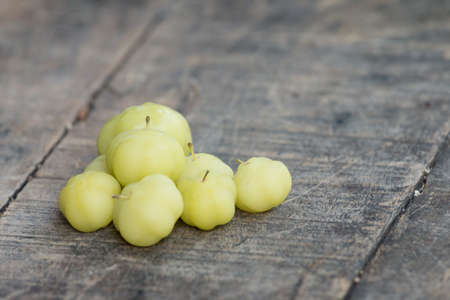 Star gooseberry on wooden tableの写真素材