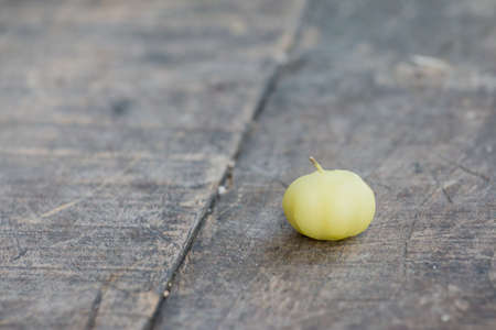Star gooseberry on wooden tableの写真素材