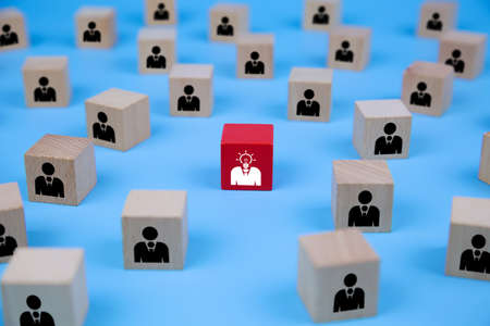 People icons on cube shape wooden toy blogs concepts human resources for business organizations and leadership.の写真素材