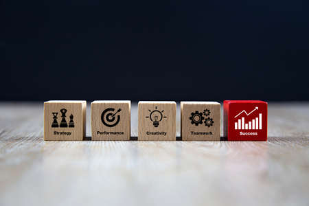 Graph icon on wooden block for business growth concept.の写真素材