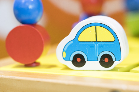 Blue Car Wooden Toy - Play set Educational toys for preschool indoor playground (selective focus)の写真素材