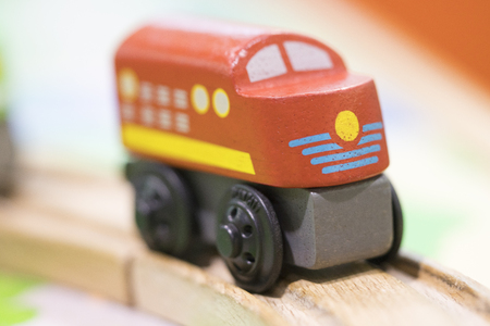 Red train Wooden toy - Toys for kids Play set Educational toys for preschool indoor playground(selective focus)の写真素材