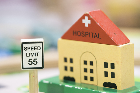 Hospital Wooden Toy Set and Speed Limit sign - Play set Educational toys for preschool indoor playground (selective focus)の写真素材