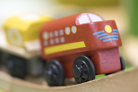 Red train Wooden toy - Toys for kids Play set Educational toys for preschool indoor playground (selective focus)の写真素材