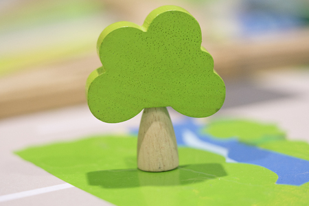Woody toy green tree  - Play set Educational toys for preschool indoor playground (selective focus)の写真素材