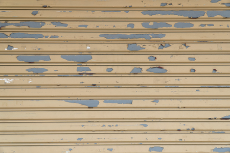 stainless rolling shutter door background, Old Slide door ,Roller shutter texture, Rusty stainless gate.の写真素材