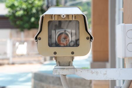 Security CCTV camera or surveillance system on the wall, Private property protectionの写真素材