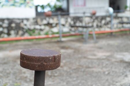 Diy metal iron dumbbell on a outdoor fitness gym floorの写真素材