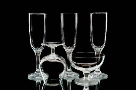 Empty wine glasses against a black backgroundの写真素材