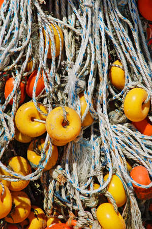 Close-up of fishing net and floats backgroundの写真素材