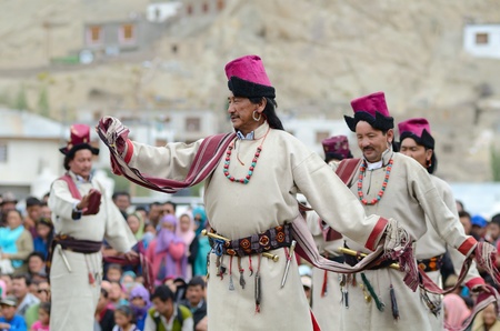 LEH, LADAKH, INDIA - SEPTEMBER 08, 2012: Artists in traditional tibetan costumes performing folk dance. Last day of Annual Festival of Ladakh Heritage in Leh, India. September 08, 2012.のeditorial素材
