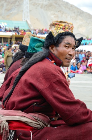 LEH, LADAKH, INDIA - SEPTEMBER 08, 2012: Man in traditional tibetan costumes. Last day of Annual Festival of Ladakh Heritage in Leh, India. September 08, 2012.のeditorial素材