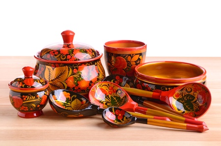Russian khokhloma, traditional wood painting handicraft souvenirs on a white background. Appeared in the second half of the 17th century in the Nizhny Novgorod.の写真素材