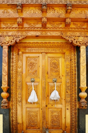 Old wood door in Buddhist monasteryの写真素材