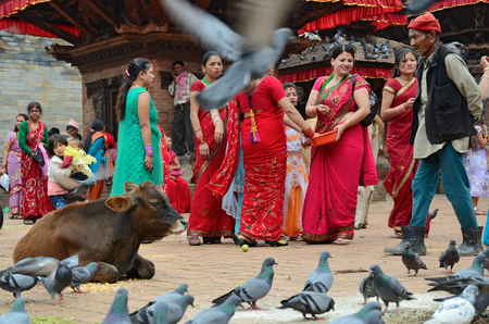Kathmandu, Nepal - September 18, 2012: Hindu women in traditional sari celebrating the Haritalika Teej festival on Durbar square in Kathmandu, Nepalのeditorial素材