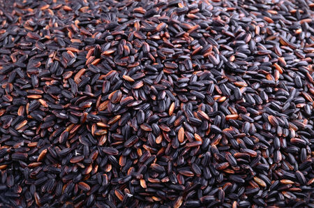 Top view of the pile of wild black riceの写真素材
