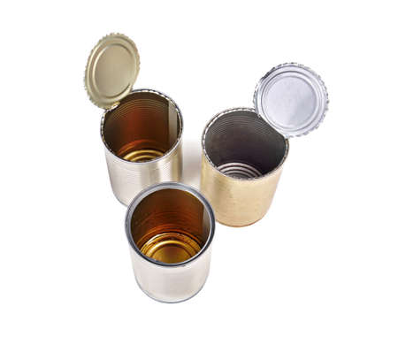 Top view of three open food tin cans isolated on white background