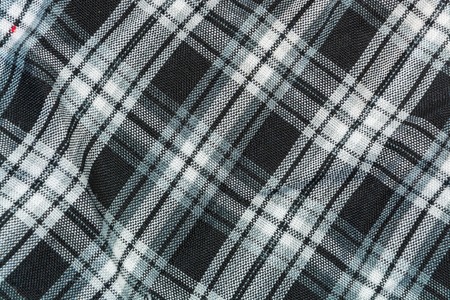 background, texture of black-and-white checkered linen fabricの写真素材