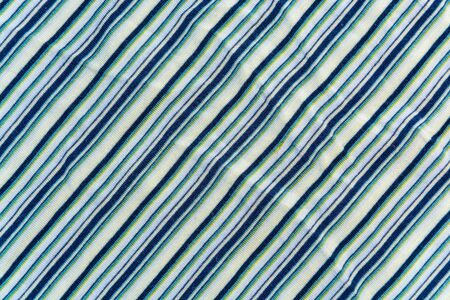 knitted fabric in black, yellow stripesの写真素材