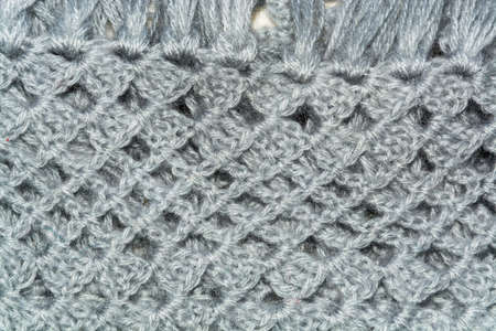 texture of gray knitted a hook openwork fabric
