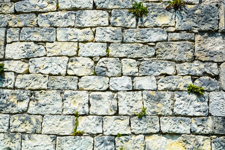 gray-brown background, texture stone masonryの写真素材