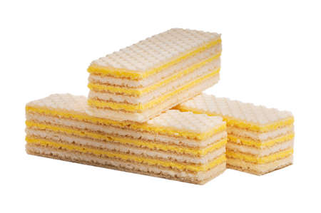 Three rectangular puff yellow waffles on a white background