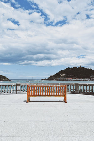 bench located in front of the bay of San Sebastian in the Basque country in Spain on June 21, 2021のeditorial素材