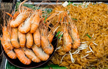 Jumbo shrimps with tasty and spicy noodle pad thai asian food