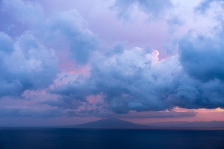 View of Vesuvio volcano with beautiful sunrise red and cloud sky in the morning, southern Italyの写真素材