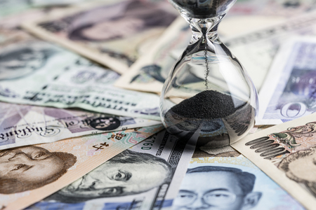 Time running or long term investment concept with sandglass or hourglass on many countries...